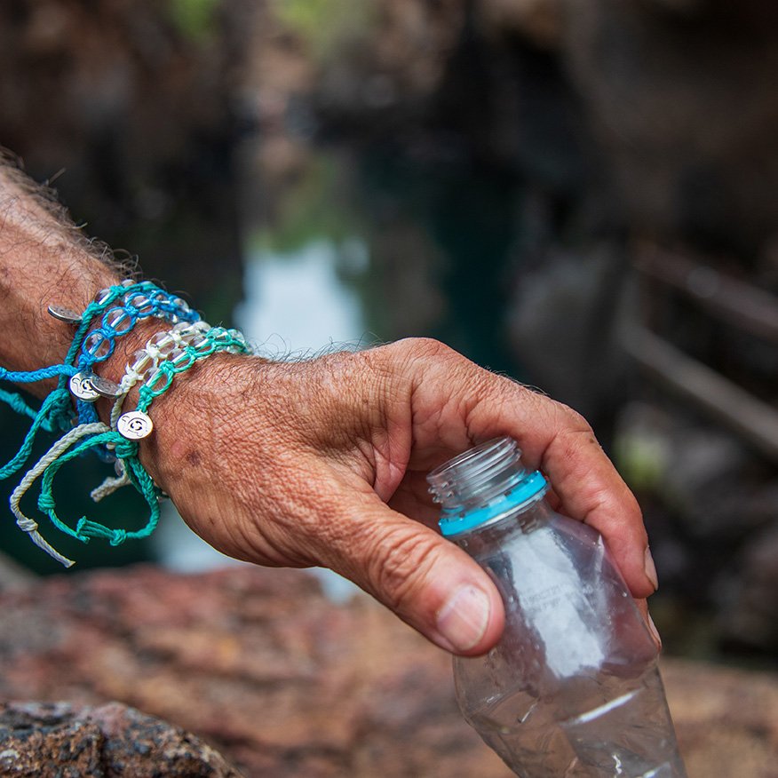 Collecting plastic wearing the bracelets